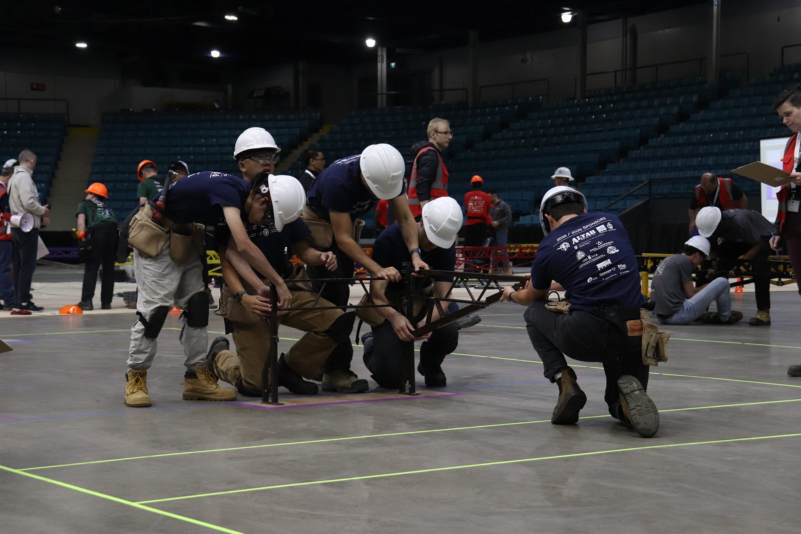 The team huddling before the build