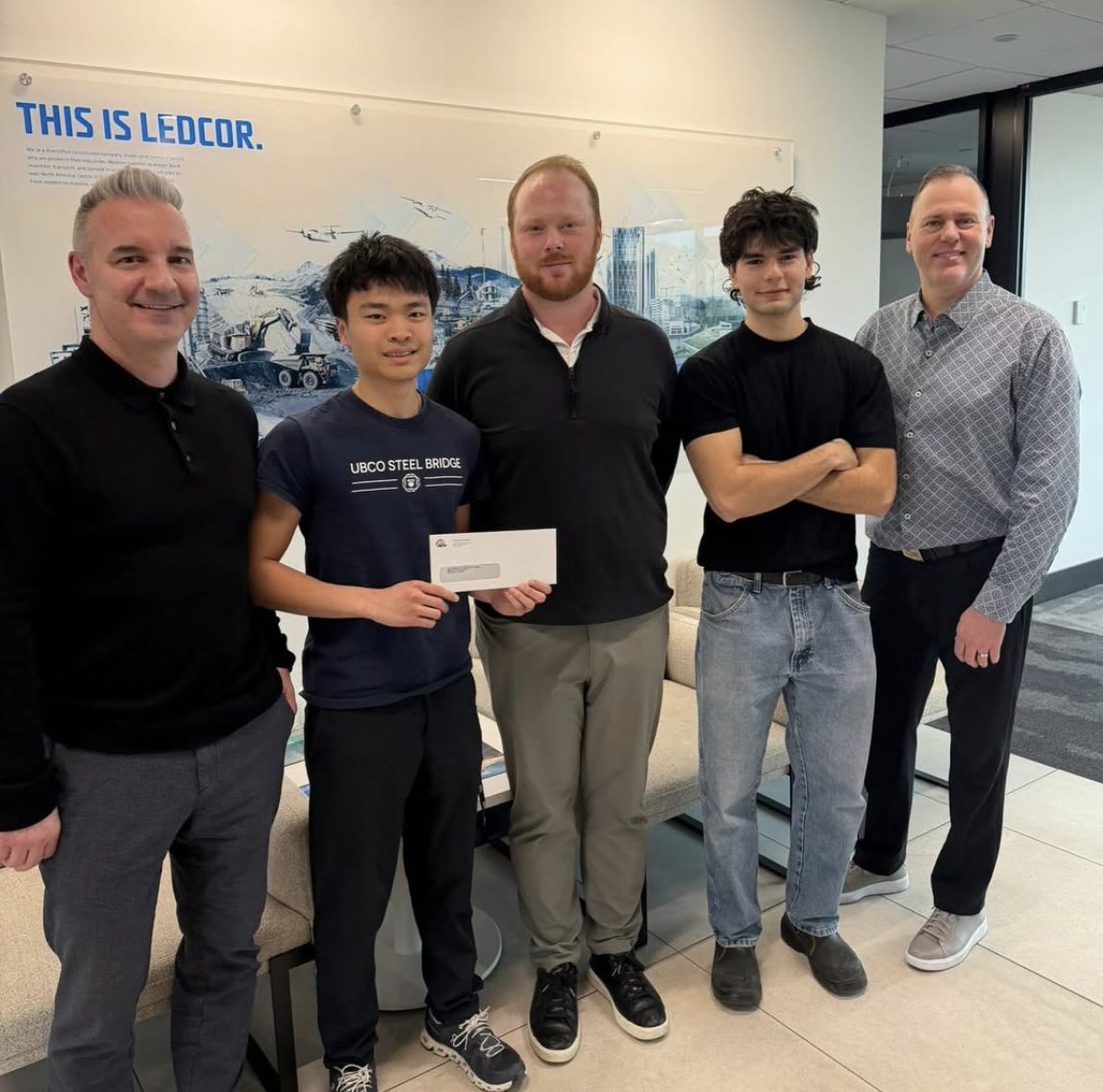 The team visiting sponsor Ledcor